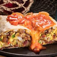 Huck's Breakfast Burrito · Your choice of grilled ham, sausage, bacon or andouille sausage tossed with bell peppers, on...