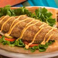 Catfish Po-Boy · Crispy shrimp on a toasted sourdough roll with leaf lettuce, ripe tomatoes, pickles and srir...