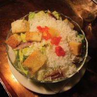 Baby Caesar Salad · Romaine lettuce, Parmesan cheese, anchovies, house-made garlic croutons. The dressing does n...