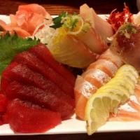 SASHIMI OMAKASE (21 PCS OF SASHIMI) · 3 pcs of each Ahi tuna, salmon, yellowtail, albacore, Red snapper, white clam, and octopus.