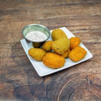 Jalapeno Poppers · Served with sour cream.