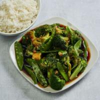 Steamed Broccoli and Snow Peas · Served with steamed rice and your choice of sauce on the side.