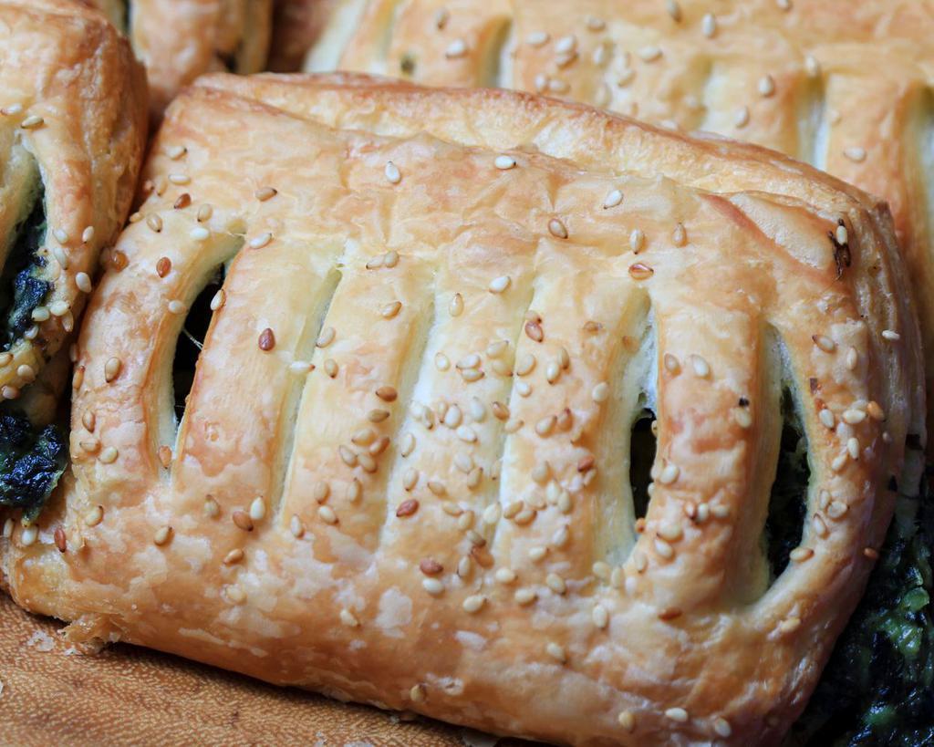 Spinach, kale and cheese criossant · a flaky croissant filled with spinach and kale mixed with cheese