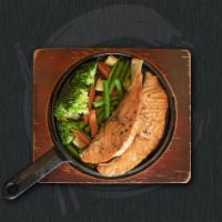 Teriyaki dinner · Grilled chicken or salmon with teriyaki sauce and vegetables. Served with steamed rice and m...