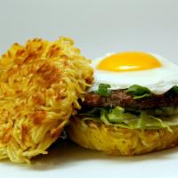 Loco Moco Ramen Burger · Well-done beef patty with egg.