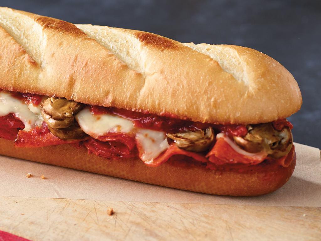 Pizza Sub · double pepperoni, mushrooms, pizza sauce, and our signature three cheese blend toasted on classic Italian bread