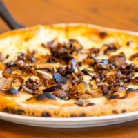 Melina Pizza · Black truffles, mozzarella, wild mushrooms, and parmigiano.
