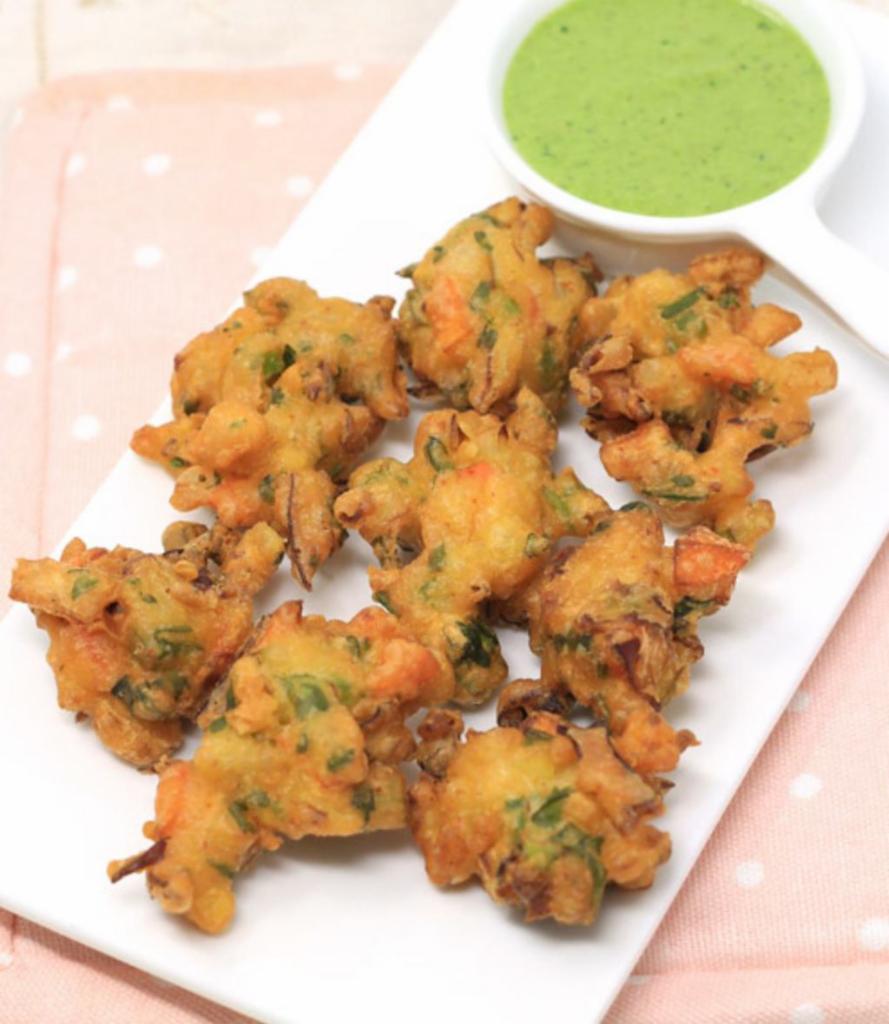 Vegetable Pakoras · Vegetables dipped in spiced chickpea battered and fried
