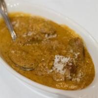 Royal Lamb Malai · Low-fat cuts of lamb cooked with creamed curry, cashew and almond paste, nuts, raisins and s...