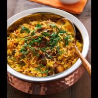 Chicken Biryani · Basmati rice cooked with chicken, herbs and spices 