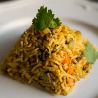 Vegetable Biryani · Basmati rice cooked with seasonal vegetables, garlic, ginger and spices
