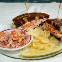 Turkey Reuben Sandwich · Turkey, Swiss, grilled with coleslaw and Russian dressing.