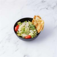 Caesar Salad · Romaine lettuce shaved Parmesan cheese with Caesar dressing.
