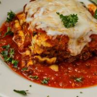 Neapolitan Lasagna Dinner · 3 cheese and meat lasagna in our homemade marinara sauce. Comes with your choice of tomato b...