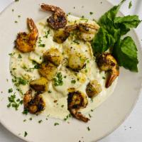 Ravioli Santa Barbara with Shrimp and Scallops Dinner · Ravioli pasta stuffed with ricotta cheese tossed in our homemade creamy Alfredo sauce topped...