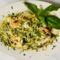 Peppered Shrimp and Scallops Scampi Pasta · Peppered shrimp and scallops in olive oil garlic sauce tossed over spaghetti pasta.
Served w...
