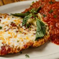 Veal Parmigiana Dinner · Breaded veal cutlets topped off with marinara and mozzarella cheese served with pasta marina...