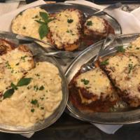 Tuscan Feast - feeds 3  · 3 Italian classics Fettuccine Alfredo, Lasagna and Chicken parmigiana .Comes with garlic bre...