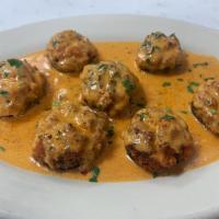 Stuff Mushrooms · Stuffed with Crab Meat and topped with a Creamy Vodka Sauce.