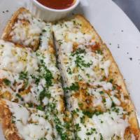 Garlic Bread with Cheese · Buttery bread that is topped with garlic.  