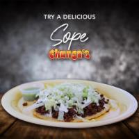 Sope · Corn fried, tortilla, choice of meat, black beans, lettuce, sour cream and queso fresco.glut...