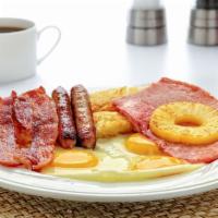 Big Breakfast Special · 3 eggs, 2 pieces of bacon, 2 sausage links, ham, pineapple ring, hash browns, choice of toast.