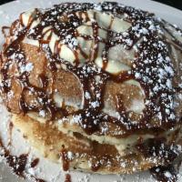 Boston Creme Pancake · Sweet cream buttermilk pancakes stuffed with creamy cheesecake and topped with Sanders hot f...