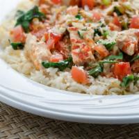 Bourbon Sriracha Chicken · Bourbon Sriracha chicken with rice, sauteéd onion, green peppers, fresh spinach, tomatoes in...