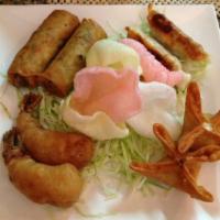 16. Combination Plate for 2 · Egg roll, potsticker, fried prawn, crab rangoon.