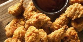 Chicken Tenders · Hand-breaded chicken tenderloins lightly fried. Served with BBQ sauce.
