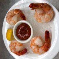 Colossal Shrimp Cocktail · Served with cocktail sauce.