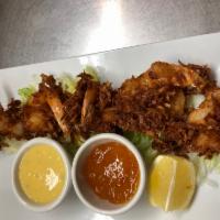 Coconut Shrimp · Jumbo shrimp coated with snowflake coconut accompanied with an apricot and honey mustard sau...