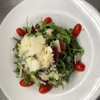 Tri Color Salad · Radicchio, arugula, endive, halved grape tomatoes, shaved Parmesan, balsamic vinaigrette.