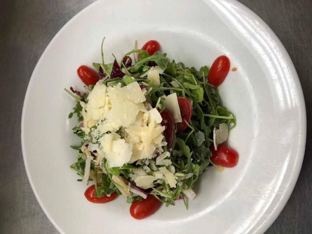 Tri Color Salad · Radicchio, arugula, endive, halved grape tomatoes, shaved Parmesan, balsamic vinaigrette.