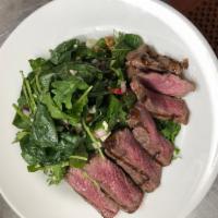 Steak and Gorgonzola Salad · 5 oz. NY strip steak, organic baby spinach, organic baby arugula, sliced red onions, julienn...