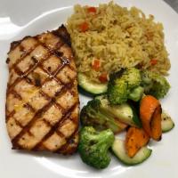 Atlantic Salmon · 8 oz. filet grilled or blackened served with seasoned rice and sauteed vegetables.