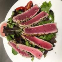 Seared Ahi Tuna · 8 oz. fresh tuna steak pan-seared with a white and black sesame crust drizzled with a wasabi...