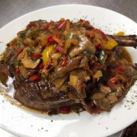 Double Cut Pork Chop Giambotta · Potatoes, onions, sausage and hot and sweet peppers sauteed in a spicy marinara.