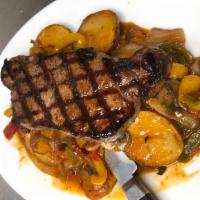 16 oz. NY Strip Steak Giambotta · Potatoes, onions, sausage and hot and sweet peppers sauteed in a spicy marinara.