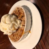 Homemade Apple Crisp · Granny Smith apples seasoned with cinnamon 
and sugar then sprinkled with buttery crumb 
top...