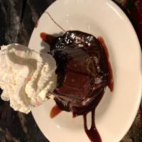 Chocolate Lava Cake · chocolate cake filled with chocolate ganache
served warm with vanilla bean ice cream
