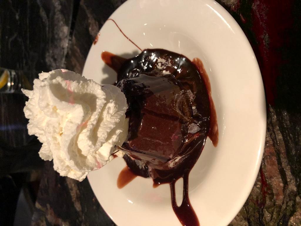 Chocolate Lava Cake · chocolate cake filled with chocolate ganache
served warm with vanilla bean ice cream
