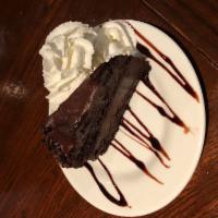 5 Layer Chocolate Cake ·  5 layers of dark, moist chocolate cake sandwiched with the silkiest smooth chocolate fillin...