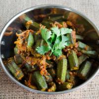 Bhindi Masala · Fresh okra, cooked with onions, ginger, garlic, tomatoes and spices. Served with basmati rice.