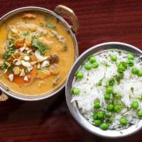 Shahi Paneer Korma · Housemade cheese cubes cooked in a creamy sauce with almonds, cashew, raisins and spices. Se...