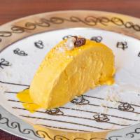 Ice Cream · Homemade ice cream made with mangoes and fresh cream sweetened to perfection.