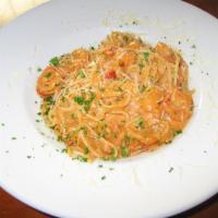 Pasta Frontera with Shrimp Dinner · Fettuccine pasta, grilled chicken in a creamy chipotle sauce.