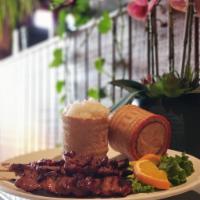 BBQ Pork on the 4 Stick with Sticky Rice · Meat that has been broiled or roasted. 