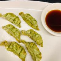 6 Vegetable Gyoza · Fried Japanese style dumplings.