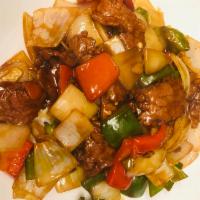 Pepper Steak Dinner · Bell peppers, onions, garlic brown sauce. Served with choice of rice.